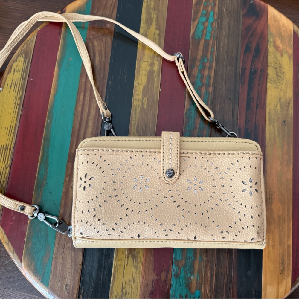 The Sak Laser-Cut Convertible Crossbody Wallet.